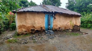 The mud walls on this home are beginning to fall apart and soon even more rain and such will be able to enter their home.